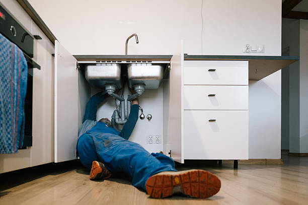 Professional Emergency Plumber technician working in Williamson, NY
